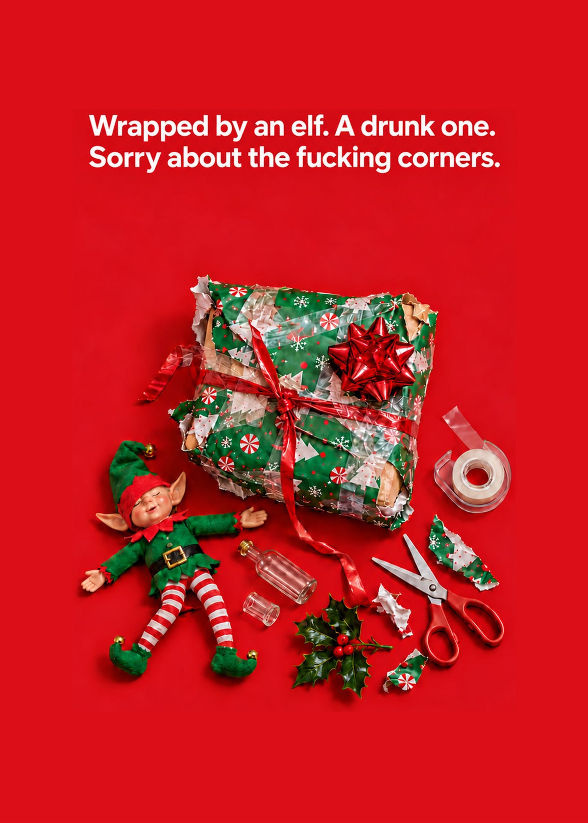 Rude Christmas card showing a photoreal flat-lay of a badly wrapped present smothered in tape beside a passed-out, by Gigglz