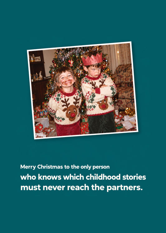 Funny Christmas card showing a retro 90s family photo of two kids in reindeer jumpers, one grinning, by Gigglz