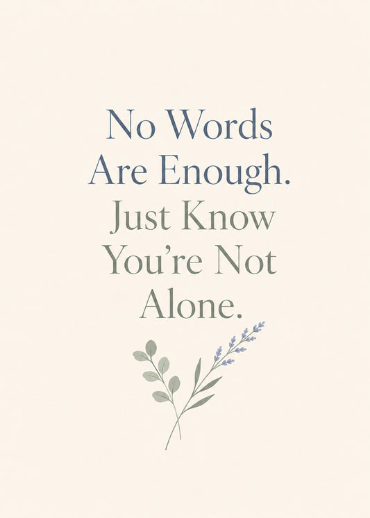 Heartfelt sympathy card showing a delicate lavender sprig on cream, with Just Know You're Not Alone text, by Gigglz